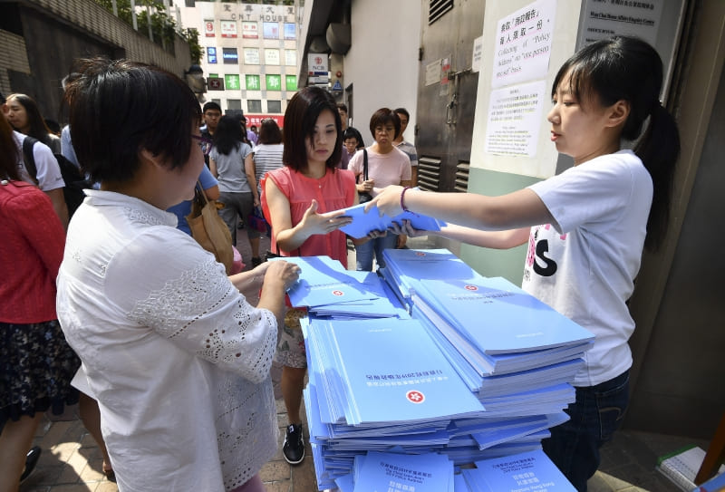 Hong Kong people informing themselves about this year's address which has housing and land supply as top priorities.